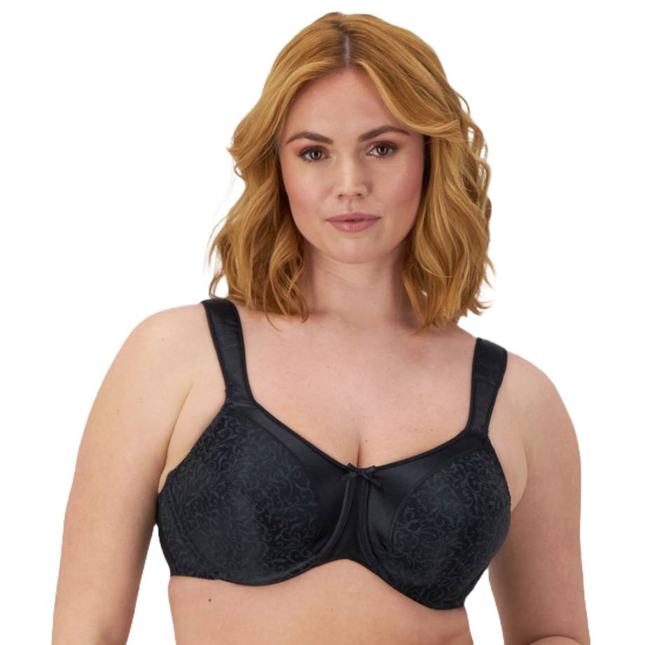 Woman wearing a black bra with a subtle floral design.