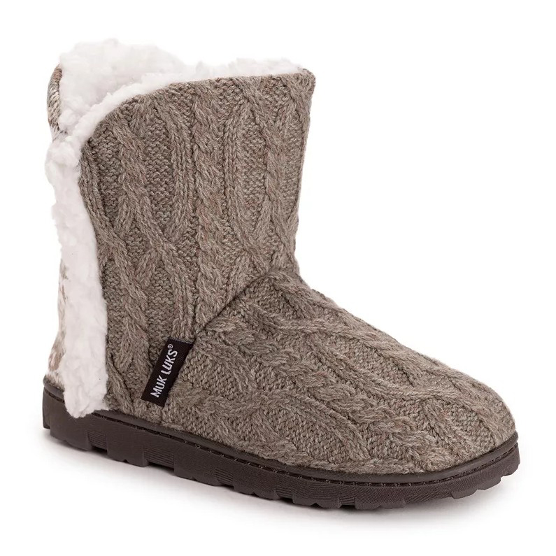 A brown knit boot with cable-knit design, featuring plush white interior lining and a rubber sole.