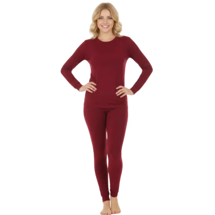A woman is wearing a maroon long-sleeve top and matching leggings, likely a thermal or lounge set. The set is available in more colors.