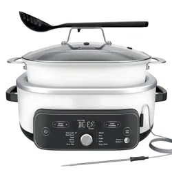 A versatile slow cooker with multiple cooking modes including slow cook, steam, sauté, bake, and sous vide, featuring a digital display, adjustable settings, and a temperature probe, with a slotted spoon resting on top.