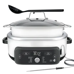 A versatile slow cooker with multiple cooking modes including slow cook, steam, sauté, bake, and sous vide, featuring a digital display, adjustable settings, and a temperature probe, with a slotted spoon resting on top.
