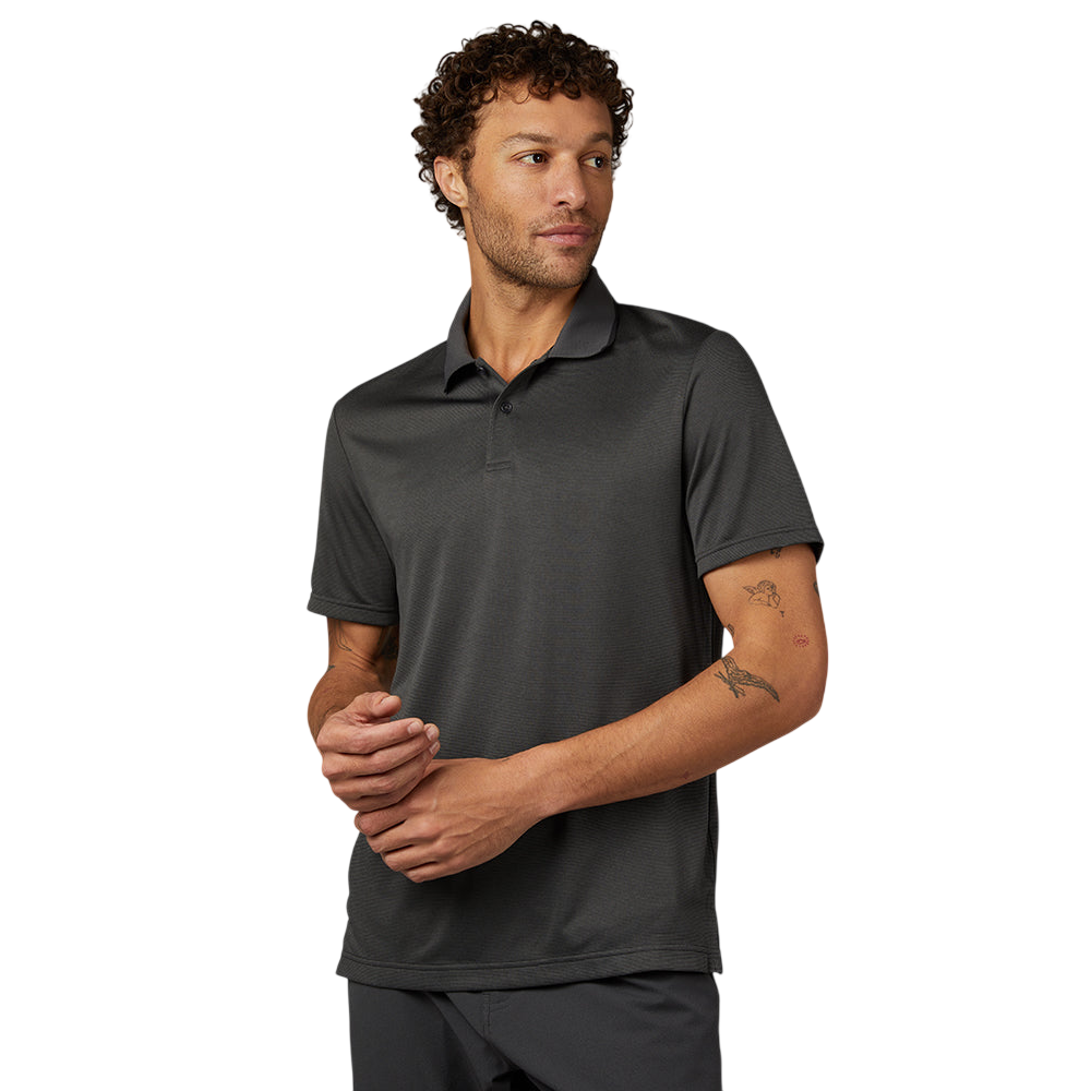A man is wearing a dark gray short-sleeve polo shirt with a simple collar design.