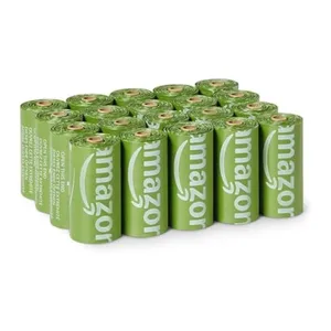 A pack of green AmazonBasics trash bags, with each roll labeled with the Amazon logo.