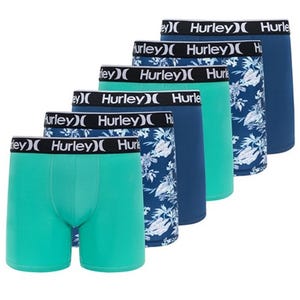 The 6-pack of Hurley boxer briefs includes a mix of solid teal, solid blue, and blue with tropical patterns, all featuring a black waistband with the Hurley logo.