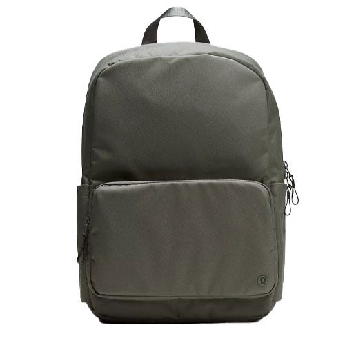 A sleek, gray backpack with a minimalist design featuring a large main compartment, front pocket, side pocket, and subtle logo at the bottom.
