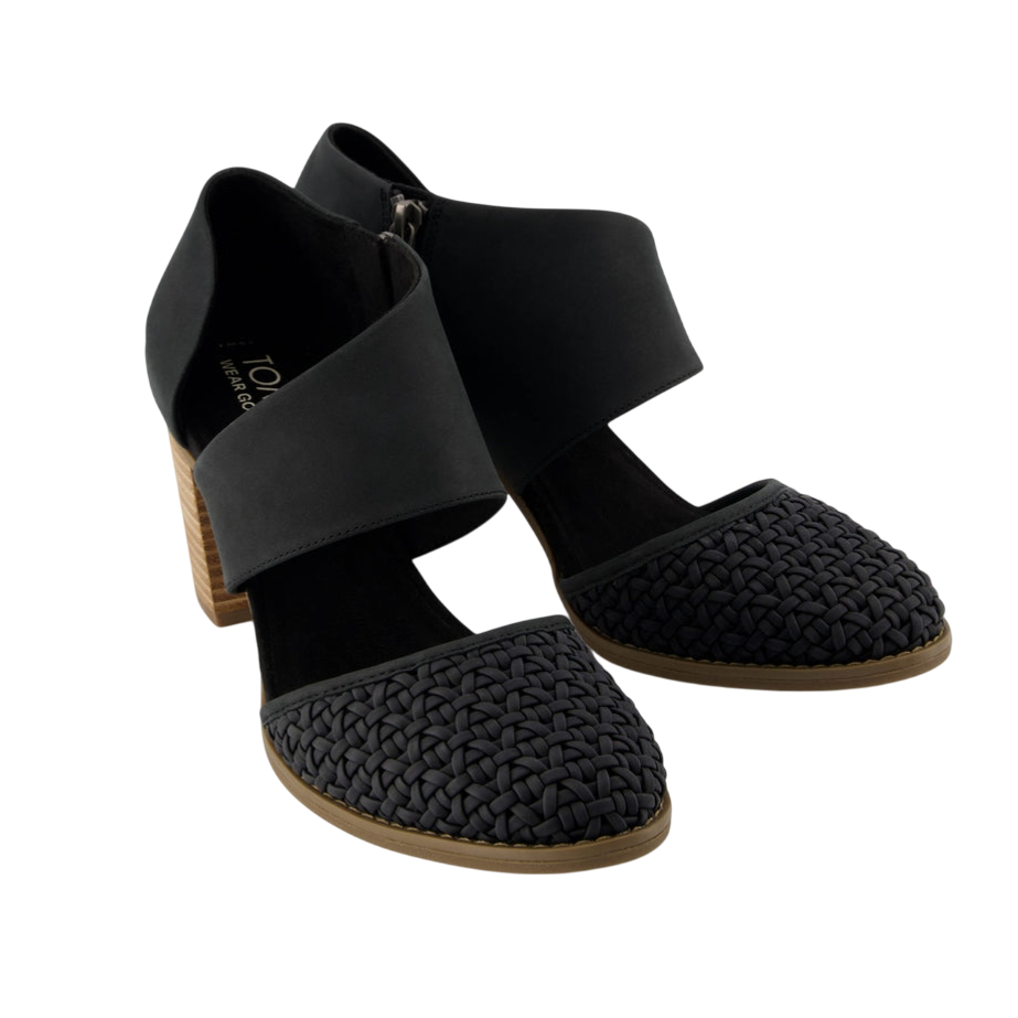 Black high-heeled shoes with a woven toe design, wide ankle straps, and wooden block heels.