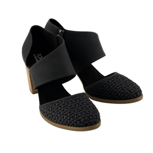 Black high-heeled shoes with a woven toe design, wide ankle straps, and wooden block heels.