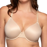 A woman wears a nude-colored, full-coverage bra with smooth cups and adjustable straps.