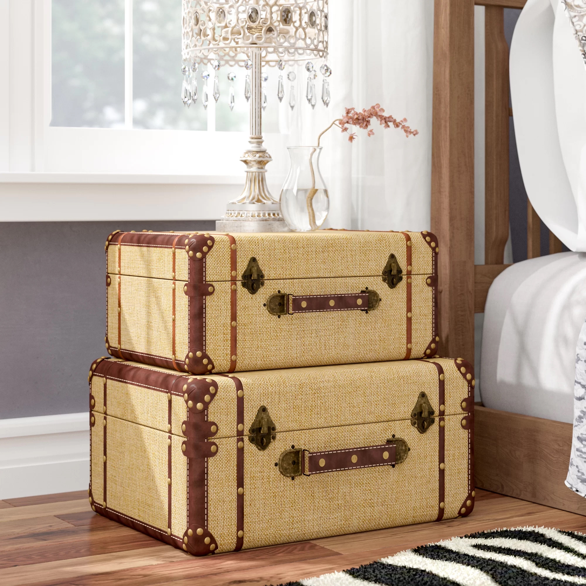 Two vintage-style decorative suitcases stacked in a home setting.