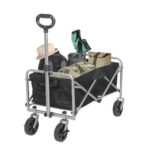 A foldable utility wagon with four wheels contains various items, including bags, a hat, and a cooler.