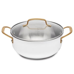Cuisinart 4.5qt Dutch Oven with a stainless steel body, clear lid, and gold-tone handles. The internal markings show measurements up to 3 liters or 12 cups.