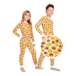 Two children are wearing Halloween-themed pajamas covered in pumpkin and jack-o'-lantern patterns, with white cuffs and collars. A close-up view highlights the orange and black pumpkin designs.