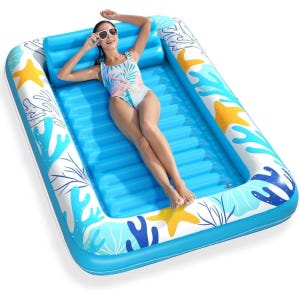 Inflatable pool float lounger with a vibrant sea-themed design, including starfish and ocean waves, featuring an inbuilt backrest and ribbed seating area for comfort, predominantly in blue and white colors.