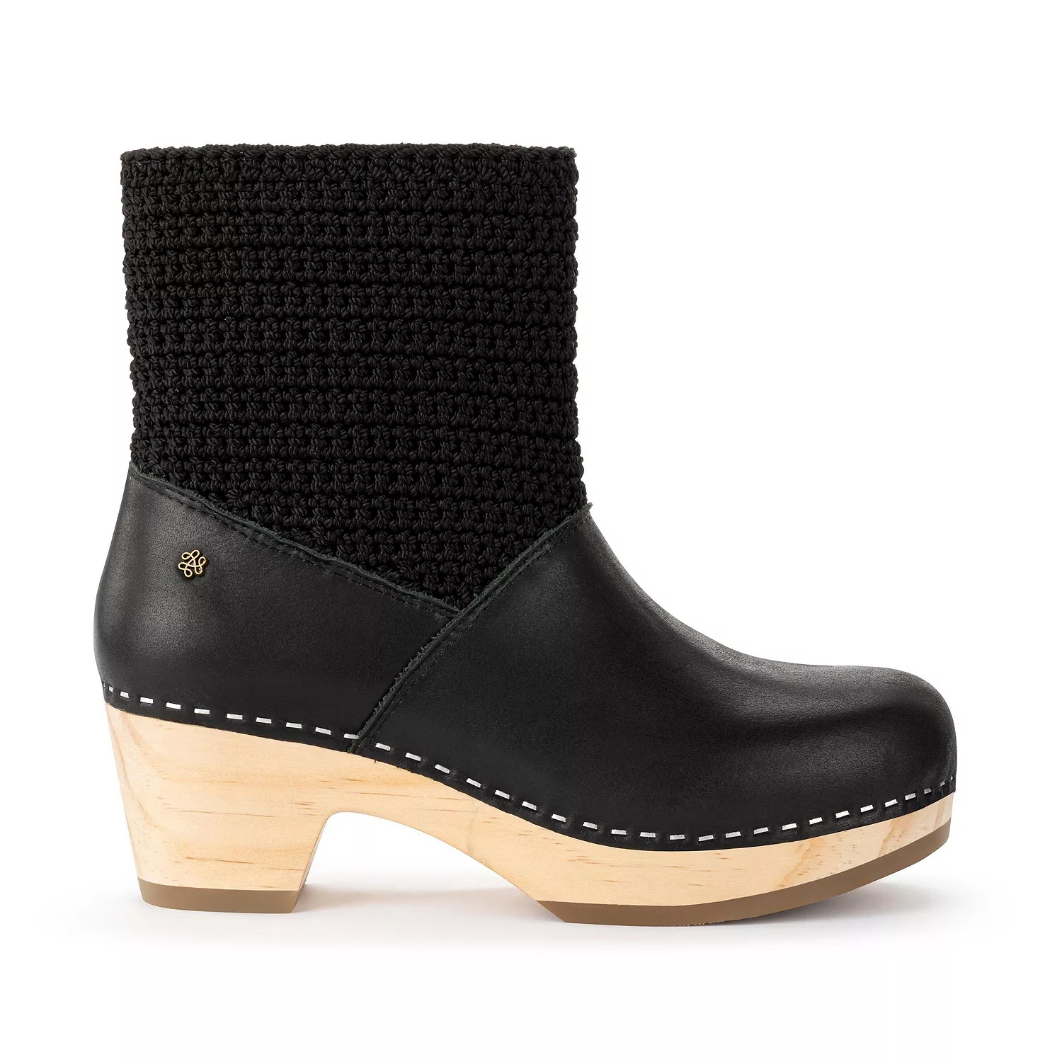 Black ankle boot with a wooden sole, featuring a textured, knitted upper section and a small decorative emblem.