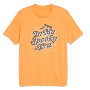 An orange T-shirt featuring the phrase \“In My Spooky Era\“ with a spider web design, bats, and a spider graphic.