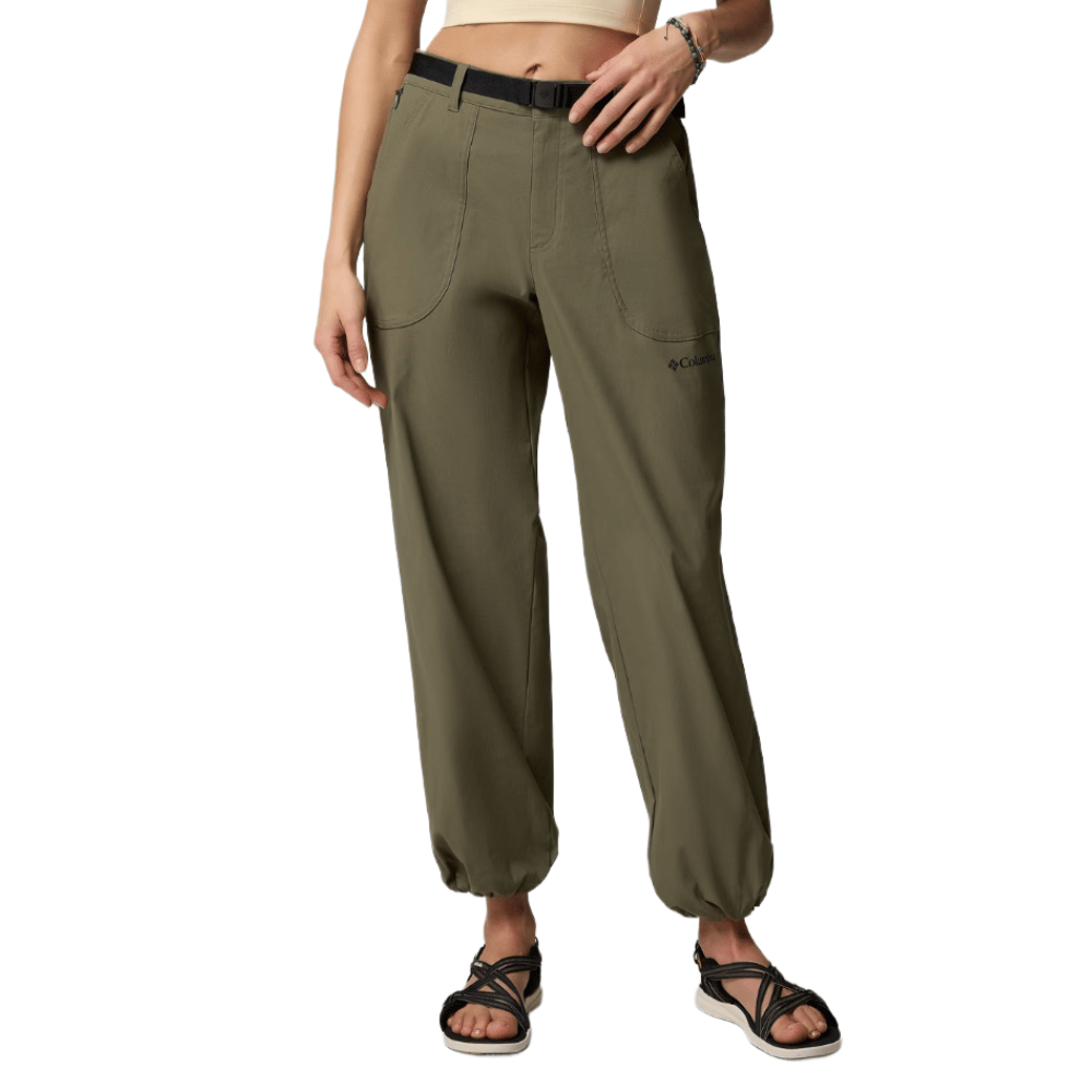 Olive green cargo pants with an adjustable black belt and elastic cuffs, featuring the Columbia logo on the thigh. Worn with black strappy sandals.