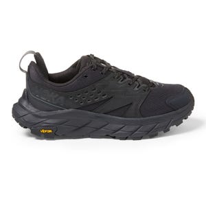 Black Hoka Anacapa Breeze hiking shoes with a mesh upper, lace-up closure, and a thick, ridged Vibram sole for traction.