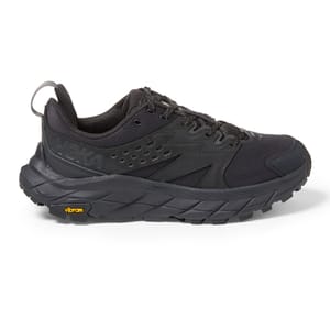 Black Hoka Anacapa Breeze hiking shoes with a mesh upper, lace-up closure, and a thick, ridged Vibram sole for traction.