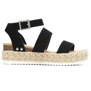 Black platform sandal with a jute rope sole, featuring adjustable ankle straps and a buckle closure.