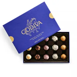 A box of Godiva Belgian truffles featuring a variety of flavors from their Patisserie Selection, with 15 pieces displayed in an elegant blue and gold package.