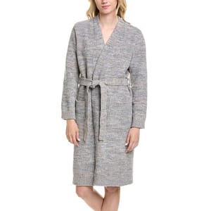 A woman is wearing a knee-length, long-sleeve knit robe with a belted waist, featuring a marled gray pattern.