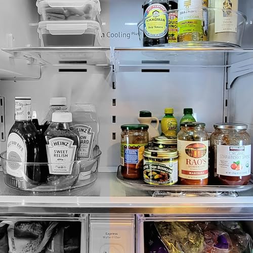 A turntable with various condiments, including mustard, relish, soy sauce, and jarred sauces, sits on a refrigerator shelf.
