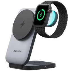 A dual wireless charging stand for a smartphone and smartwatch, featuring the AUKEY logo and MagSafe compatibility. It supports simultaneous charging of both devices.