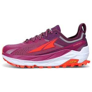 Altra Olympus 5 Women's Shoes feature a vibrant purple design with red accents, a cushioned white sole, and orange Vibram grip for enhanced trail performance. They offer a breathable mesh upper and a balanced footbed for comfort.