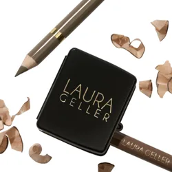 A makeup pencil from Laura Geller with a sharpener and pencil shavings.
