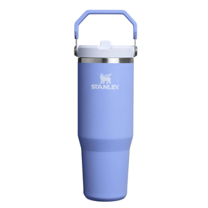 A light blue Stanley travel mug with a handle and a white lid, featuring the Stanley logo.