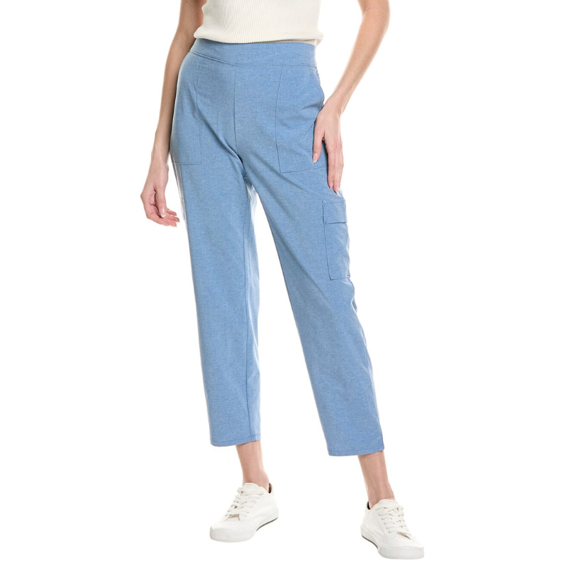 Light blue cropped pants with patch pockets, paired with white sneakers and a white sleeveless top.