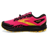 Bright pink and black trail running shoe with yellow accents, featuring a textured mesh upper and rugged sole designed for various terrains.