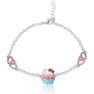 A chain bracelet featuring a central charm of a cartoon character's face emerging from a blue cupcake, flanked by two sets of pink interlocking heart charms. It includes an adjustable clasp for sizing.