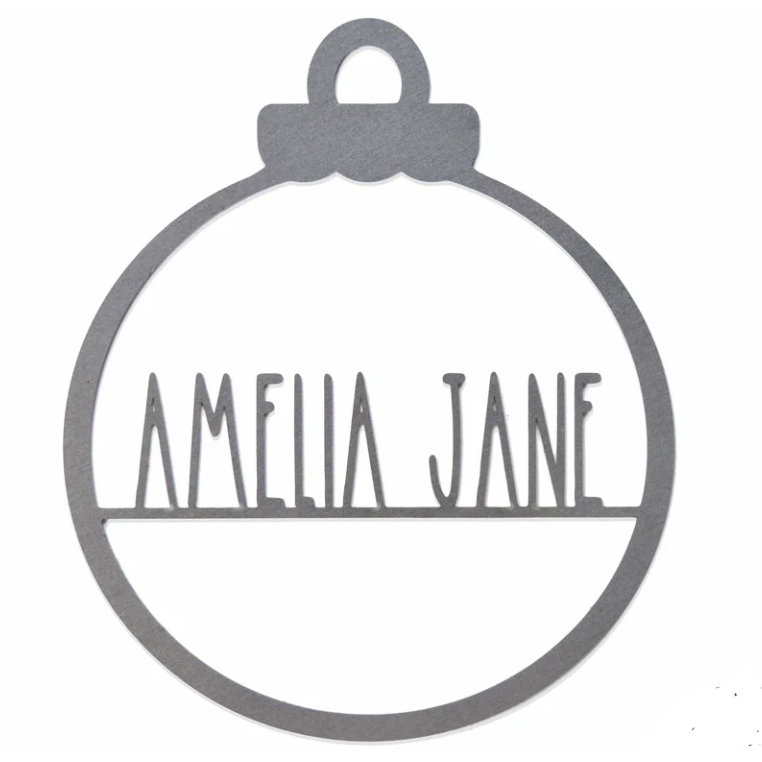 This is a steel ornament shaped like a Christmas bauble with \“AMELIA JANE\“ cut out in the center.