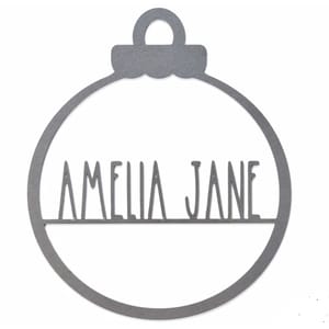 This is a steel ornament shaped like a Christmas bauble with \“AMELIA JANE\“ cut out in the center.