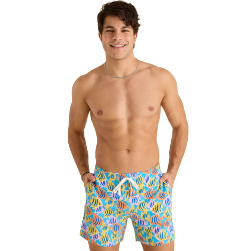 Man wearing colorful swim trunks with a fish pattern, featuring a drawstring waist.