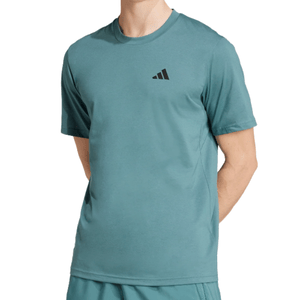 A light teal short-sleeve T-shirt with a small black geometric logo on the upper left chest, designed for casual or athletic wear.