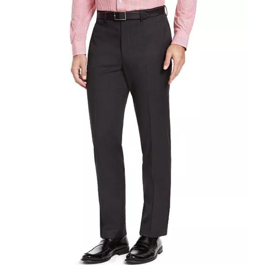 A person wearing a pink striped shirt, black dress pants, a belt, and shiny black shoes.