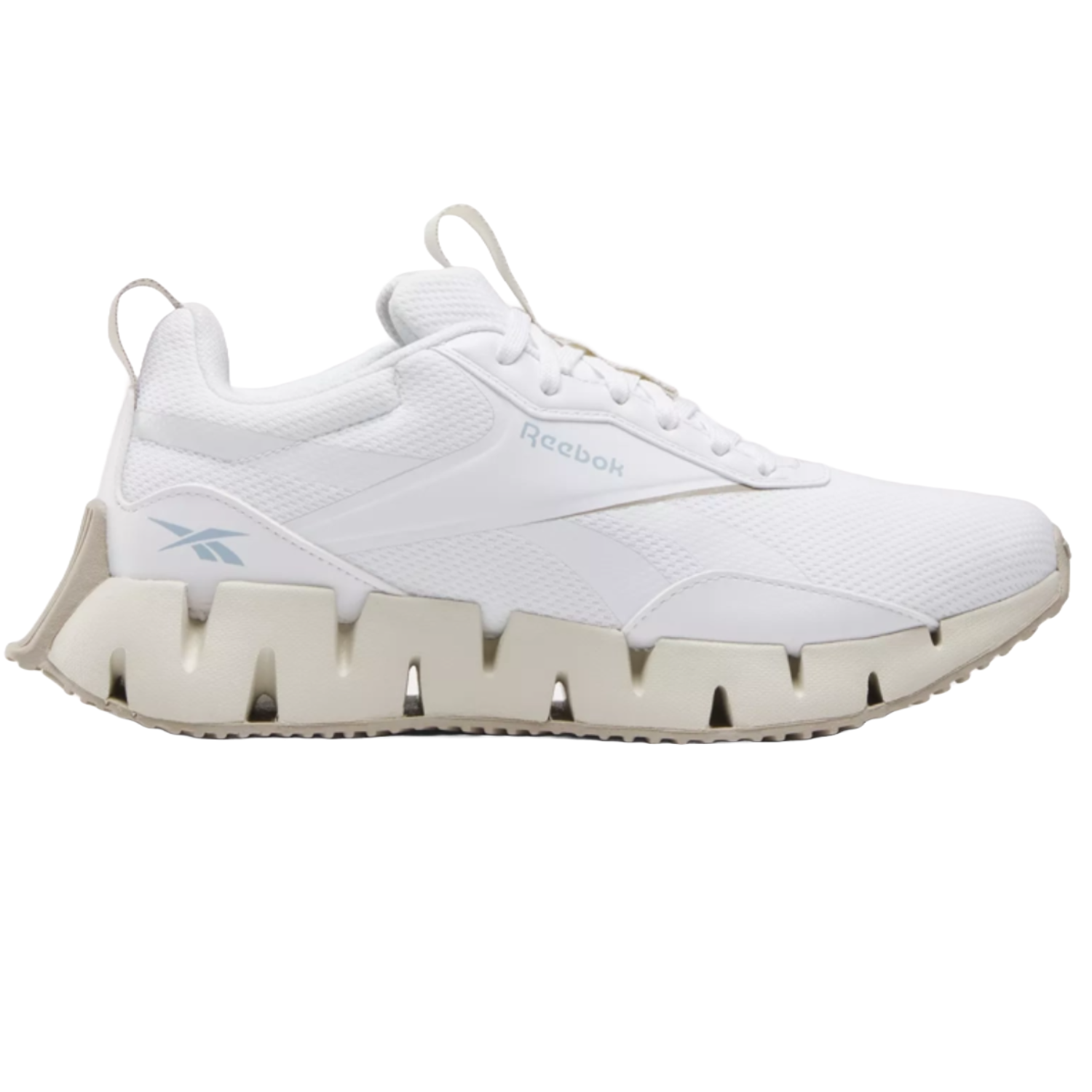 Reebok Zig Dynamica STR Shoes feature a white mesh and synthetic build with a distinctive zigzag midsole design for cushioning and style. They include pull tabs on the tongue and heel, and subtle Reebok branding in light blue.