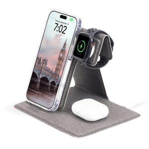 The Case-Mate Foldable Power Station is a compact, fabric-covered charging stand designed for simultaneously holding and charging a smartphone, smartwatch, and wireless earbuds.