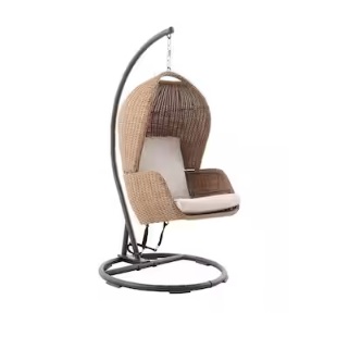 Hanging wicker chair with a curved metal stand and cushioned seat, designed for comfortable indoor or outdoor lounging.