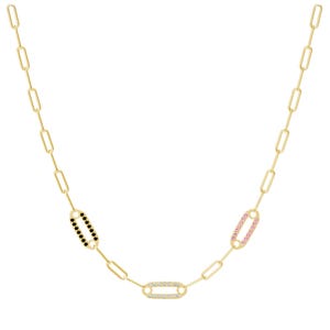 A gold necklace featuring a link chain design with three decorative oval sections, each set with small gemstones in black, white, and pink.