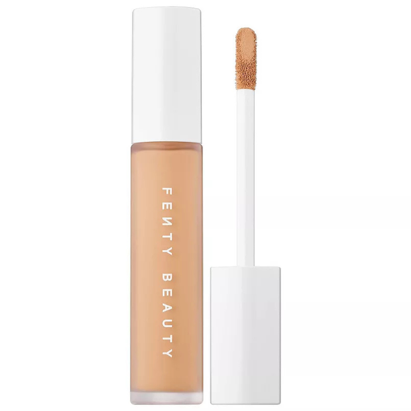 Fenty Beauty Concealer features a sleek tube with a white cap and includes a doe-foot applicator. It offers creamy, buildable coverage suitable for various skin tones.