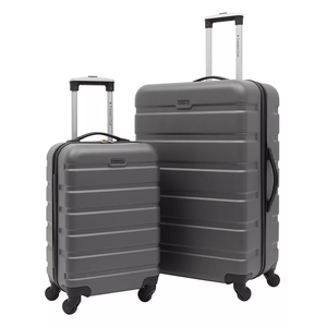 Two gray hardshell suitcases with wheels and extendable handles, one larger and one smaller.