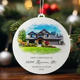 A round Christmas ornament depicting a house with the text: \“First Christmas at 22541 Rimini St. Georgia & Jacob 2025.\“