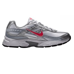 A silver and gray athletic shoe with a red Nike swoosh, featuring a white midsole and black outsole for running or casual wear.