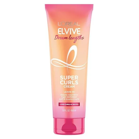 L'Oréal Elvive Dream Lengths Super Curls Cream, a leave-in treatment for long curls and waves, deeply nourishes and enhances high-definition, soft, and bouncy curls. Size: 5.1 FL OZ / 150 ml.