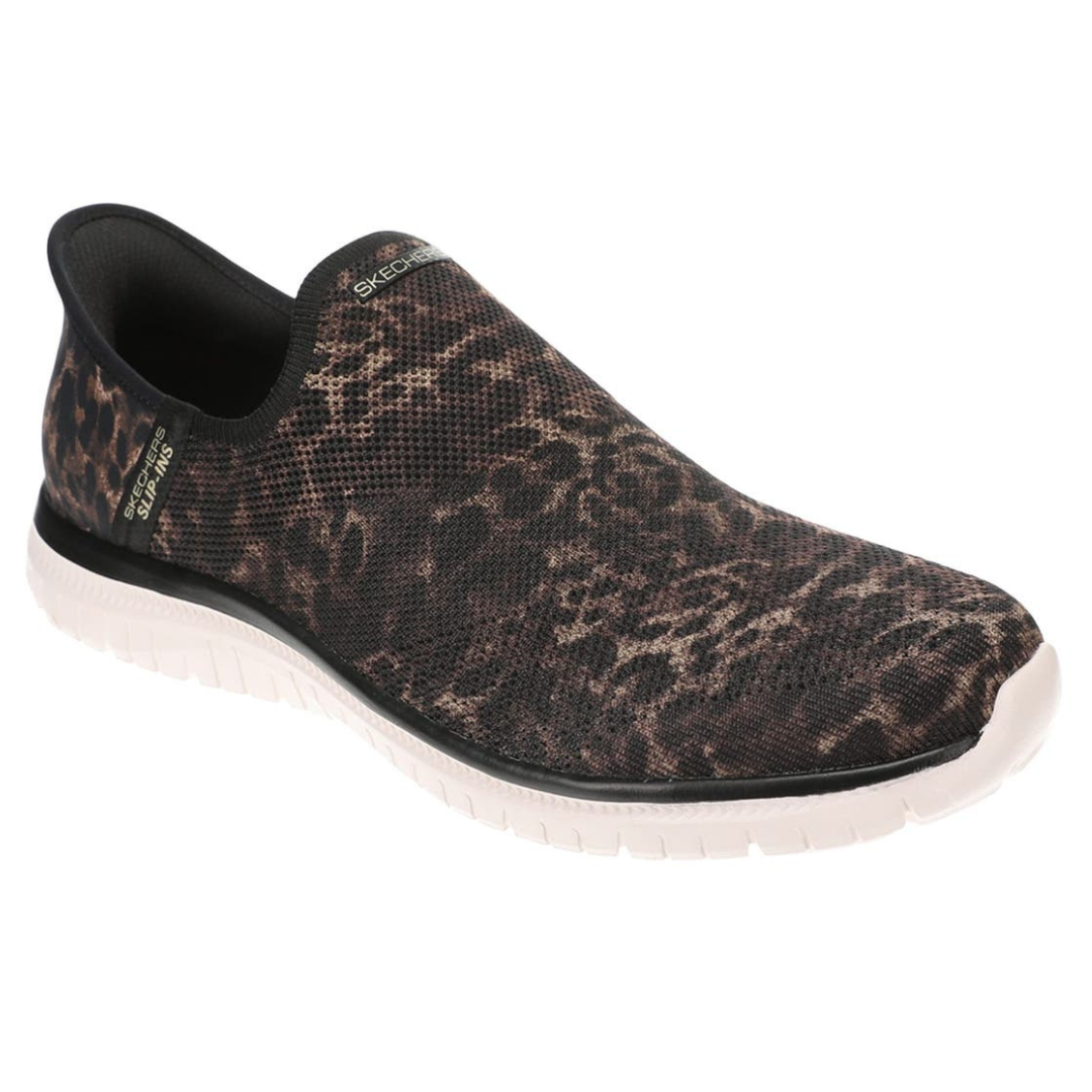 Slip-on sneaker with a leopard print design, from Skechers, featuring a breathable mesh upper and a white flexible sole.