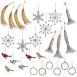 A variety of beaded and glittery holiday ornaments, including crescent shapes, snowflakes, birds, and ring designs in gold, silver, red, and neutral tones.
