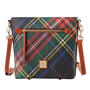 Dooney Plaid Small Zip Crossbody features a multicolored plaid pattern with a front zip pocket, adjustable brown leather strap, and gold-tone hardware. The brand's logo plaque is on the front.